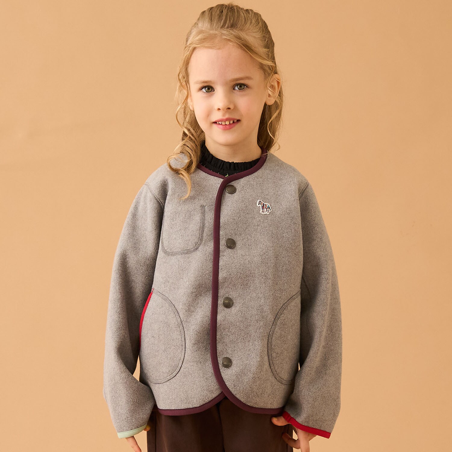 配色パイピングノーカラージャケット