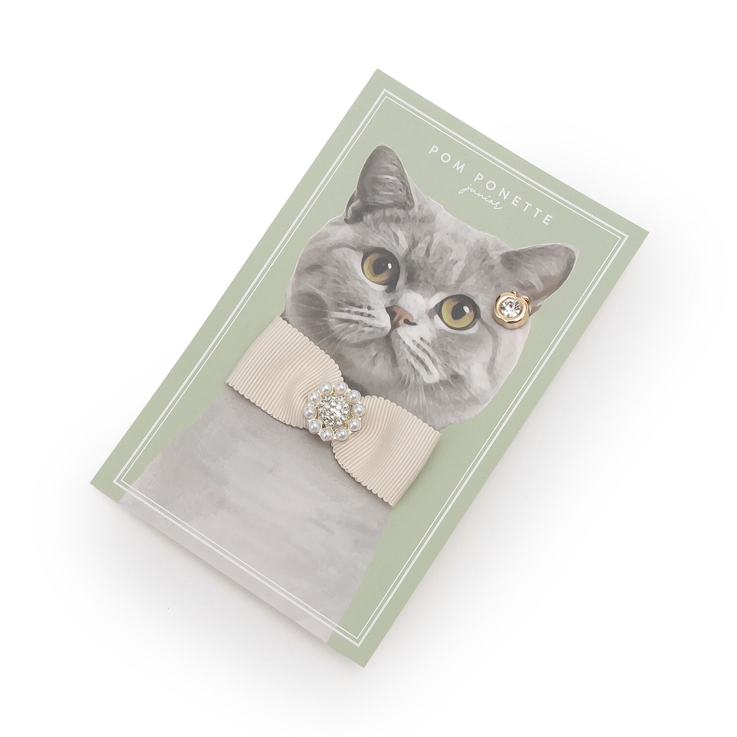 ビジューリボンブローチ