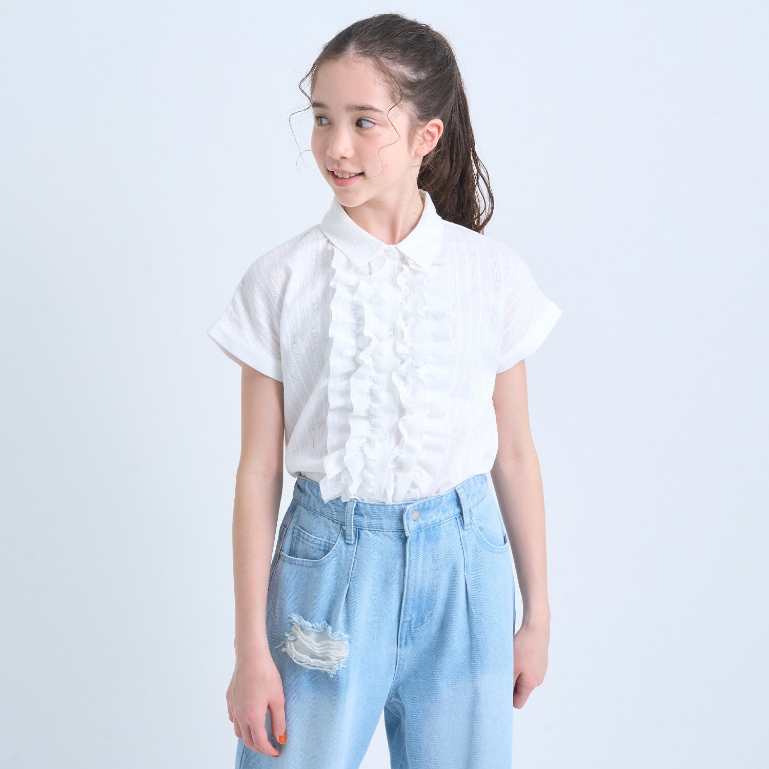 ラッフルブラウス