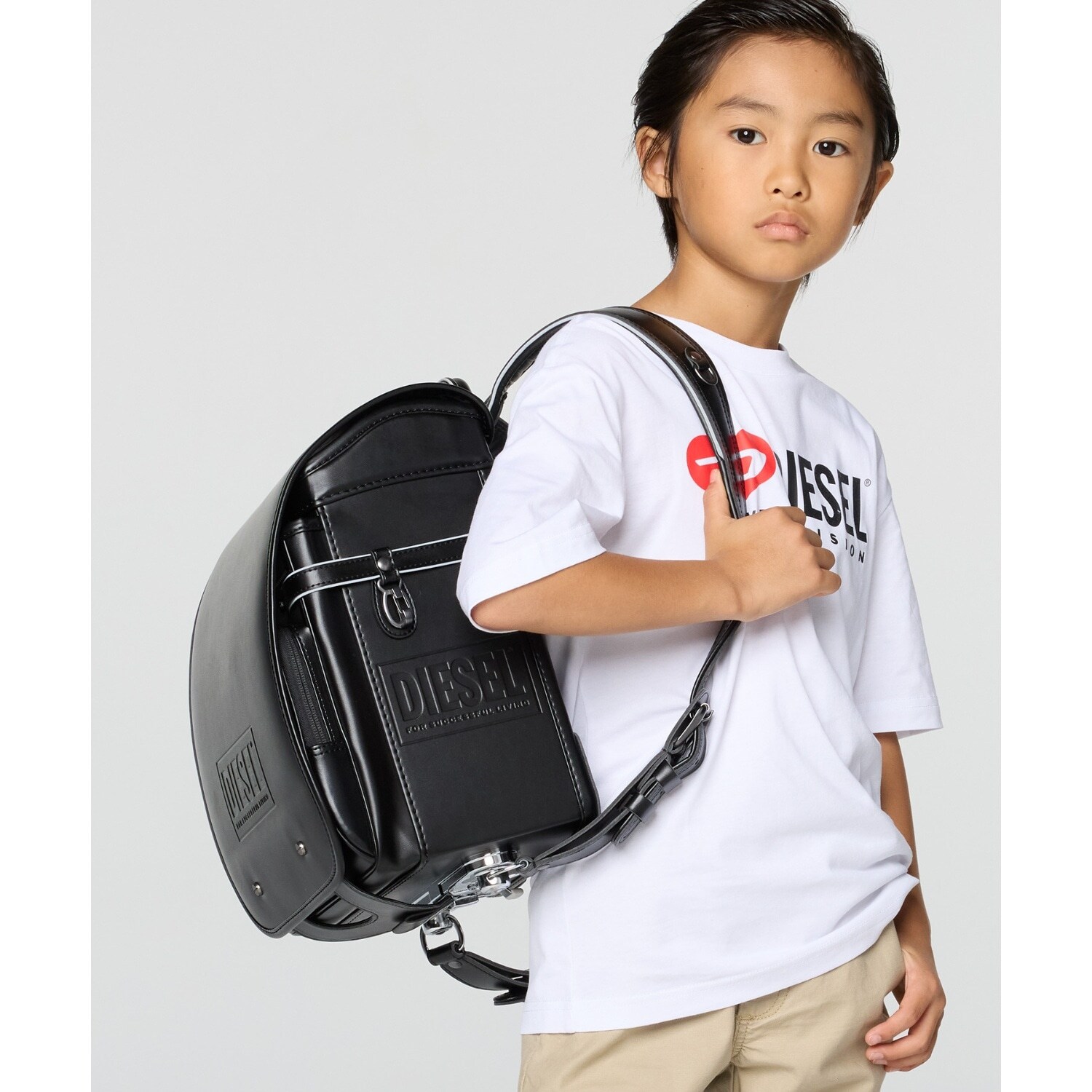 【DIESEL(ディーゼル)】EMBOSSED DIESEL BISCOTTO LOGO(エンボスド ディーゼル ビスコット ロゴ)ランドセル