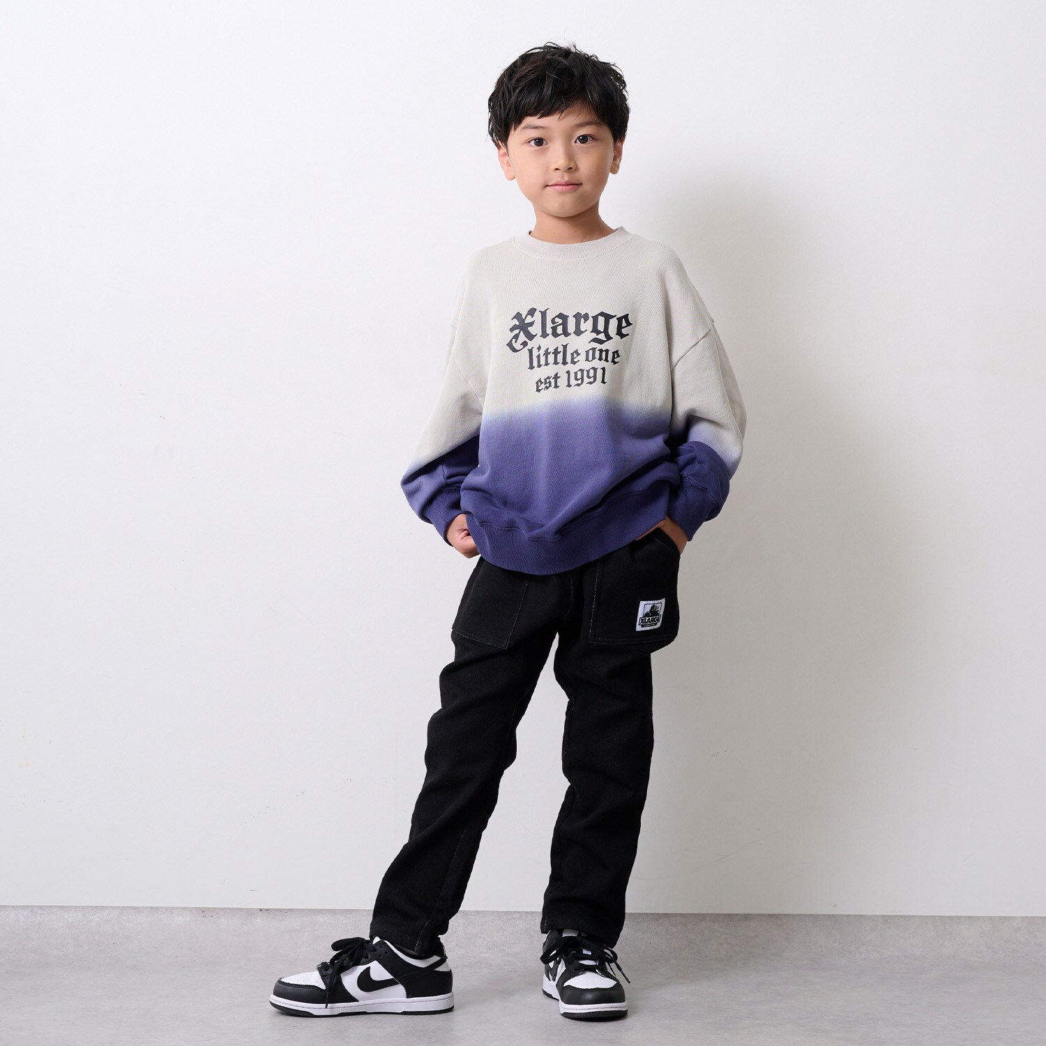 バックロゴカットデニムテーパードパンツ